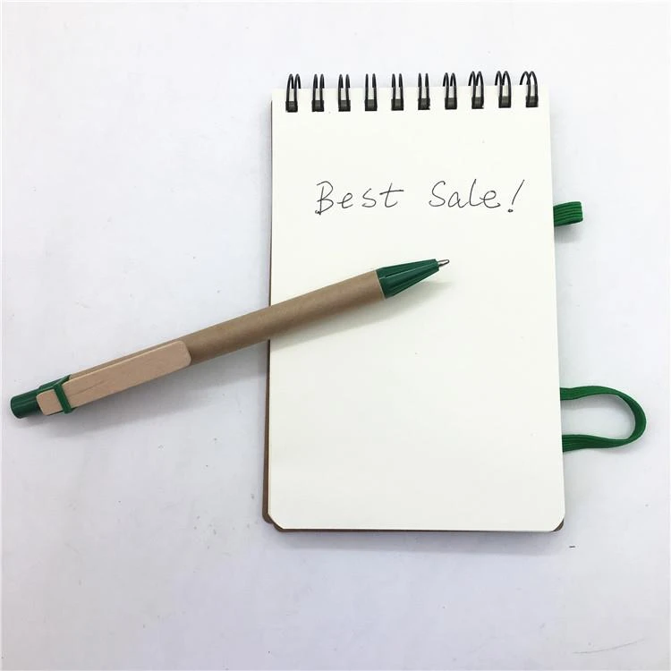 spiral notebook with pen